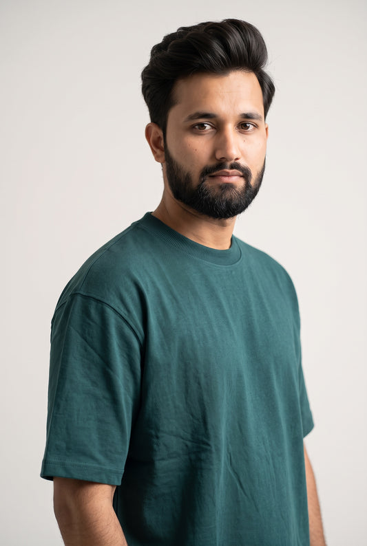 Side view of model wearing Zuke Lifestyle Bottle green t-shirt with The Band graphic