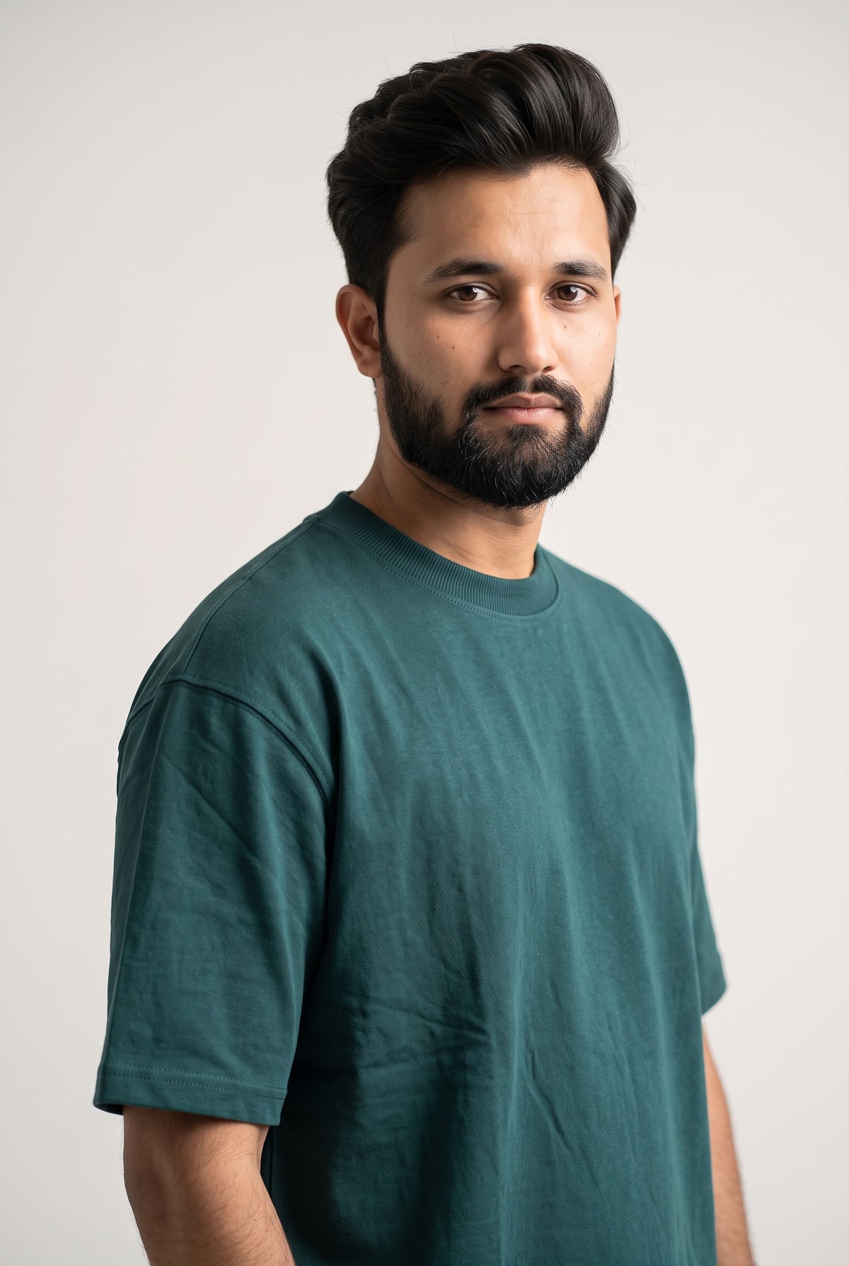 Side view of model wearing Zuke Lifestyle Bottle green t-shirt with The Band graphic