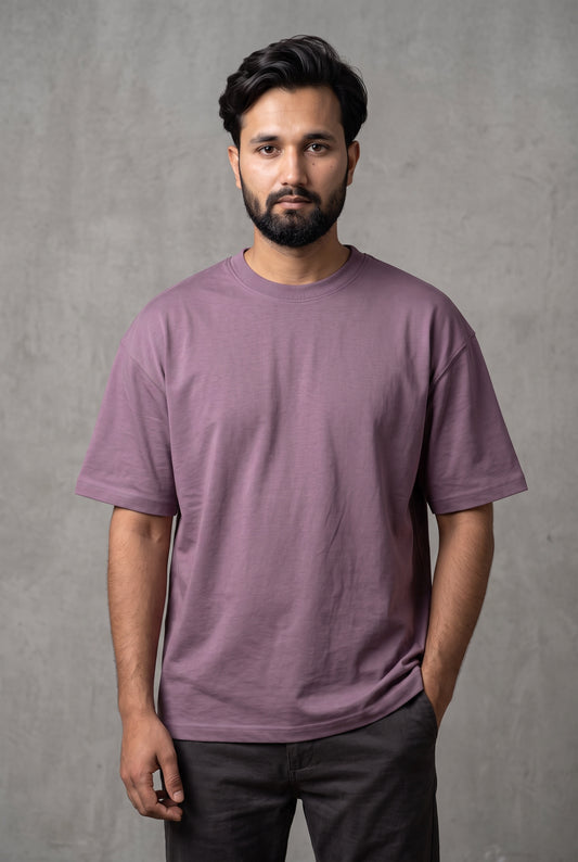 Front view of model wearing Zuke Lifestyle Mauve heavy cotton drop shoulder oversized t-shirt
