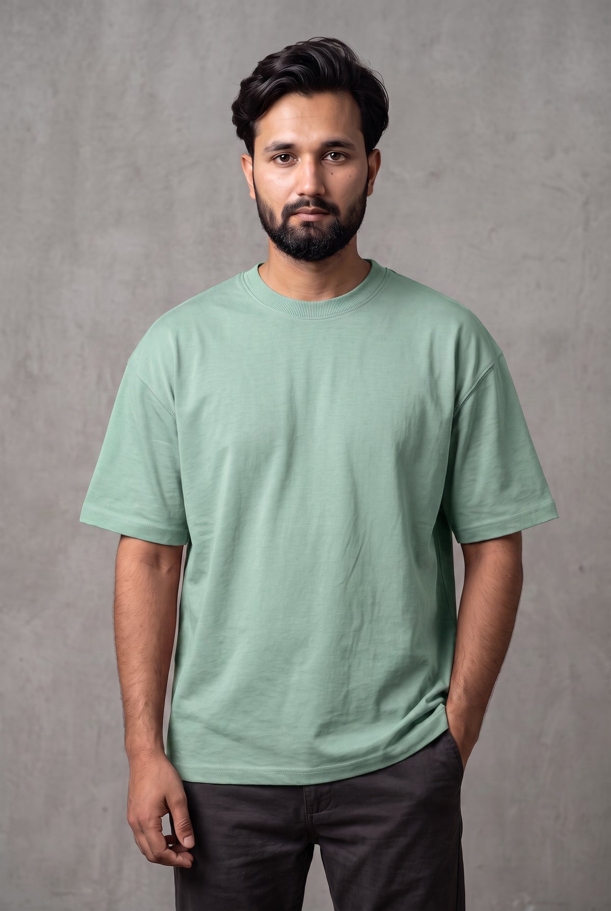 Front view of model wearing Zuke Lifestyle Sage green heavy cotton drop shoulder oversized t-shirt