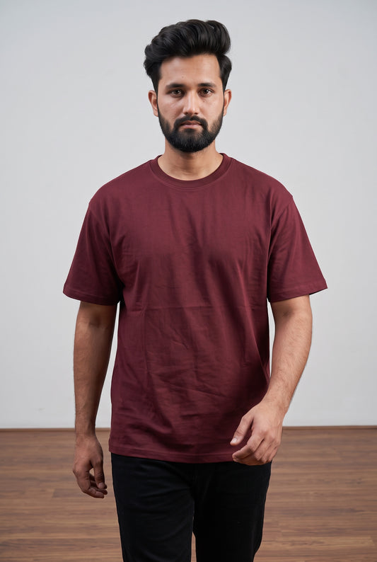 Front view of model wearing Zuke Lifestyle Wine Red heavy cotton drop shoulder oversized t-shirt